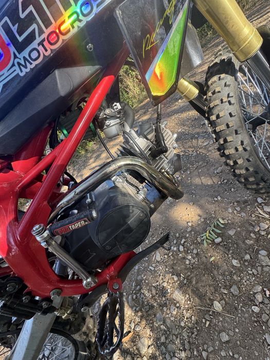 Vând motocross ultra 125 URGENT perfect functional inca in garantie