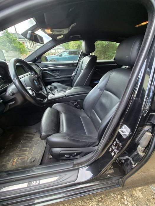 Vand scaune  bmw f 10 facelift,fete usa,oglinzi electrice,display mic