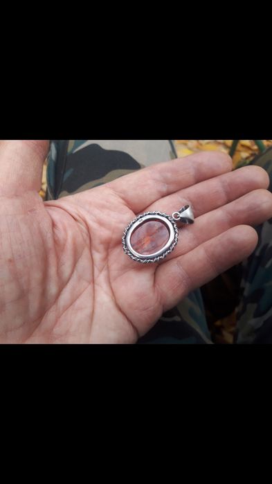 Серебряный кулон.