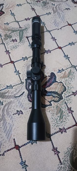 Продам Tasco 3-7х28