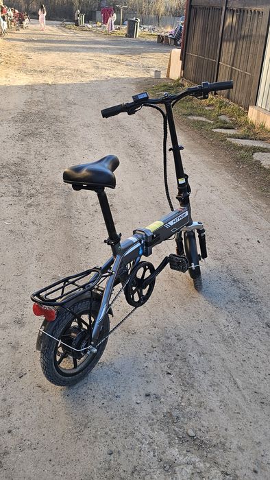 Bicicleta electrica vand/schimb cu telefon