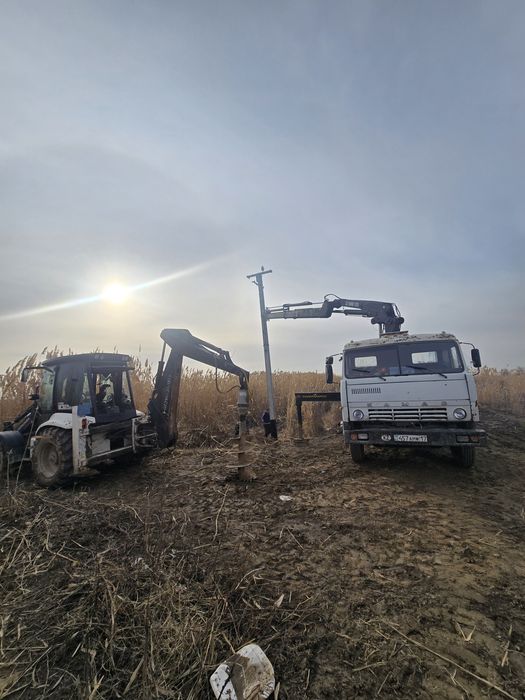 Экскаватор погрузчик ямобур