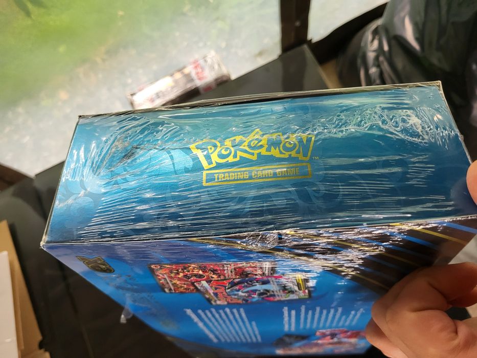 The Pokémon TCG: Mega Charizard X ex Ultra-Premium Collection
