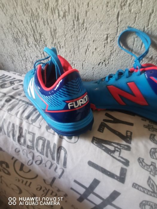Ghete de fotbal new balance furon