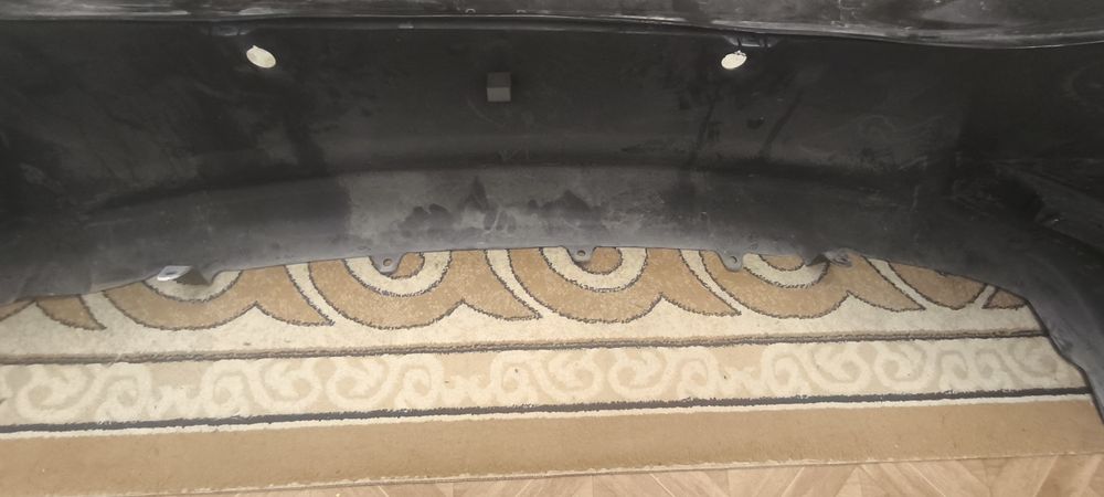 Задний бампер Toyota corolla 180