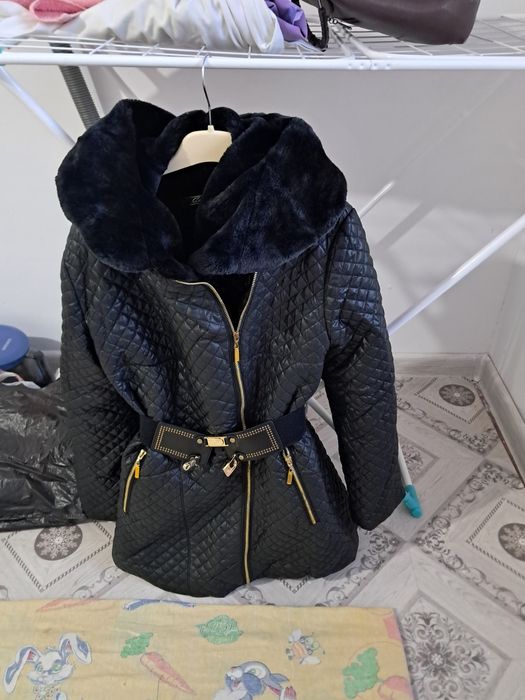 Продам зимный куртка новый