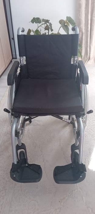 Инвалидная коляска