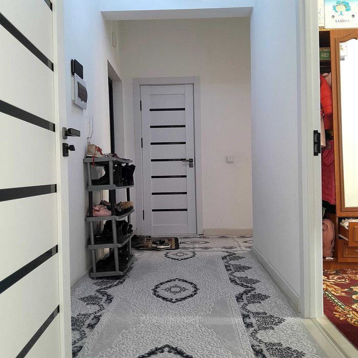 Янги хайот Спутник 16а дан 2 хонали 63 кв. квартира сотилади