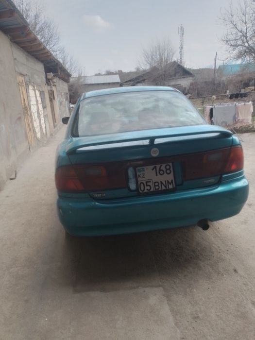 Мазда 323 ВА фамилия