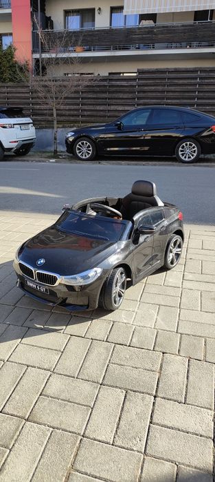 Mașinuta electrica BMW SERIA 6 GT cu telecomanda cu un singur motor