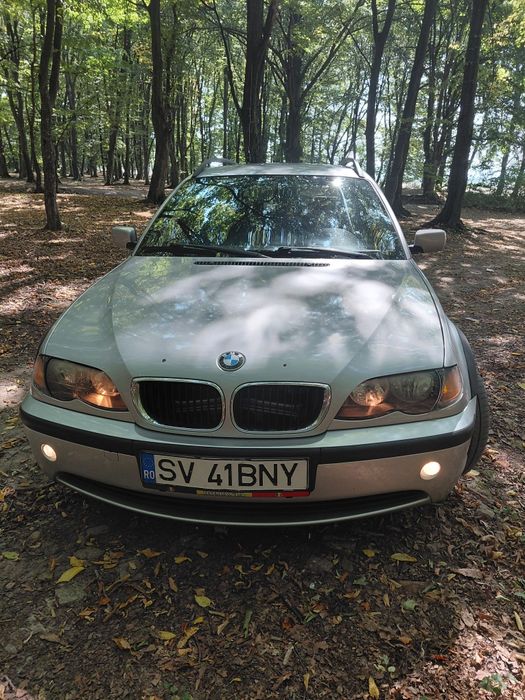 BMW 320d an 2003 150 cai