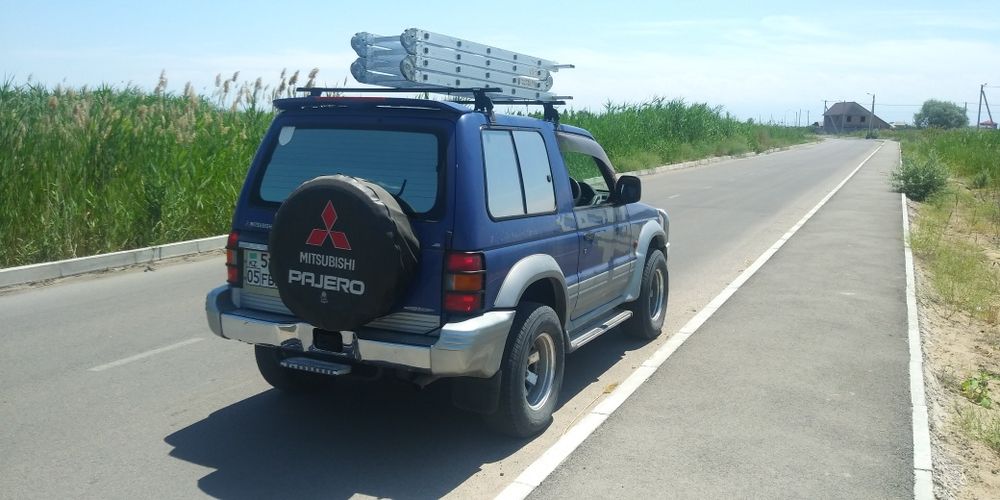 Продам рейлинги Thule для pajero 2