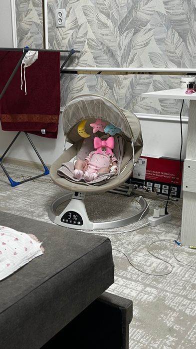 Электрокачель для новорожденных