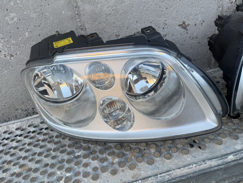 Оригинални фарове за VW Touran / Caddy (2003-2010) – Комплект, отлично състояние