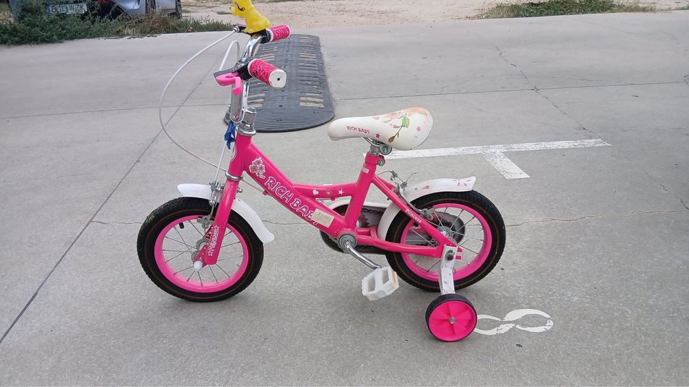 Bicicletă fetițe Rich Baby 12 inch – Stare buna, folosită de câteva ori