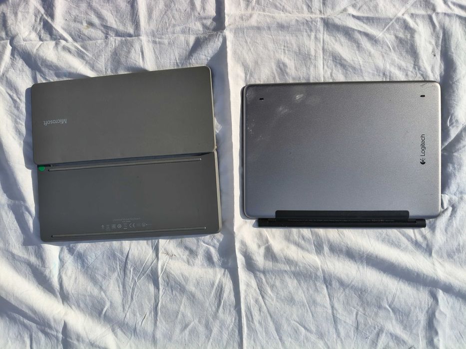 Microsoft Universal Mobile Keyboard, Logitech Ultrathin Magnetic KB