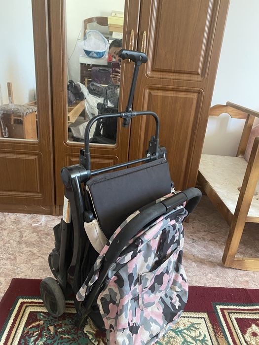 Детская прогулочная коляска