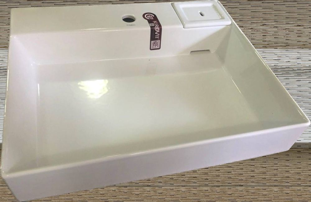 Умывальник над стиральной машиной