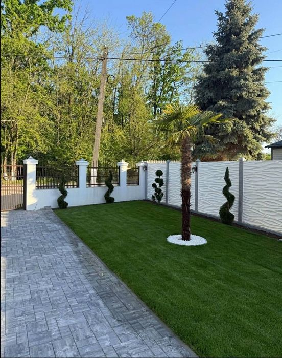 Amenajări grădini cu gazon si sistem de irigat