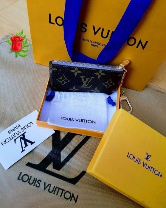 Portchei Louis Vuitton, model unisex,cutie inclusa