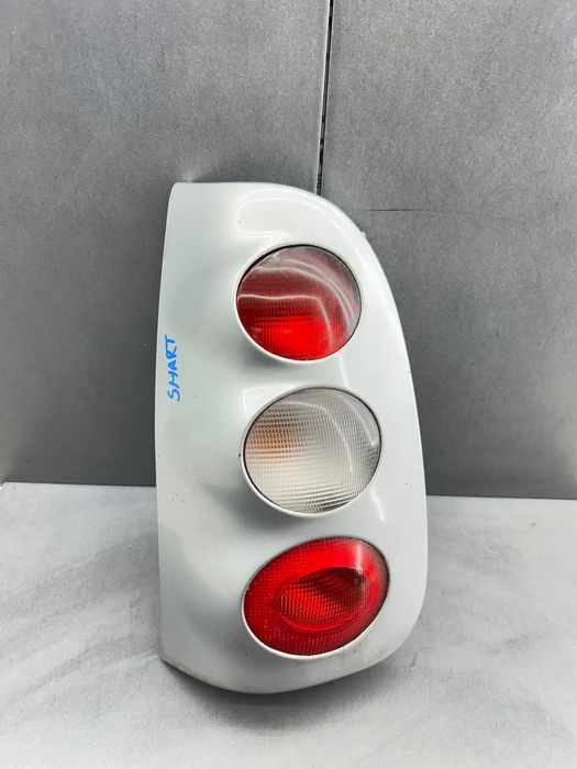 Lampa / Tripla stop stanga pe aripa 253041L Smart Fortwo 2001