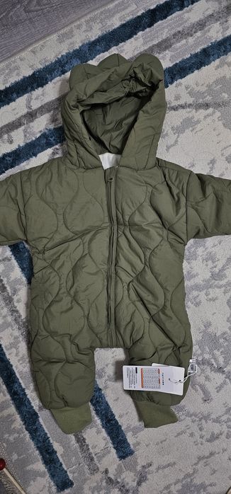Продам новый детский комбинезон