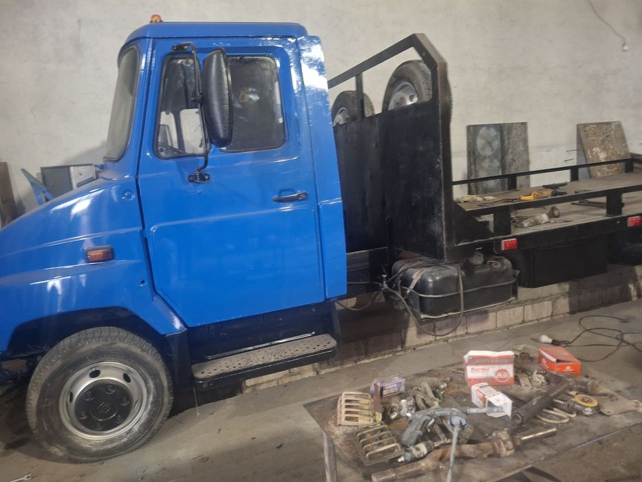 Манипулятор эвакуатор зил бычок