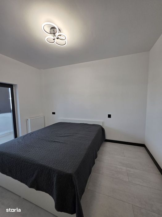 Apartament bloc nou,parcare proprie, mobilat.