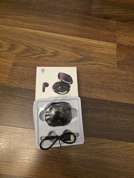 Casti wireless, cu carcasa de încărcare