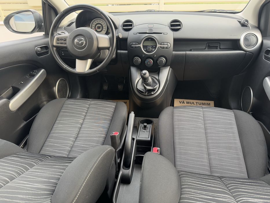 Mazda 2 - 1.4 benzina - 4 usi + Klima - Impecabila - Km putini