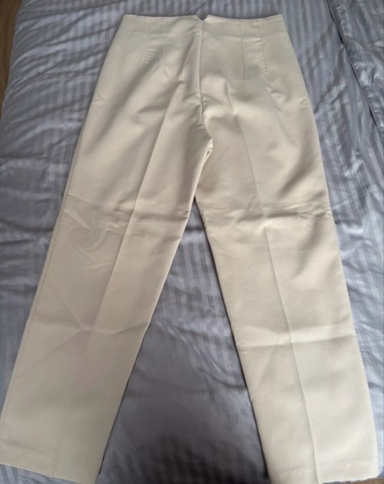 Pantaloni de stofa crem