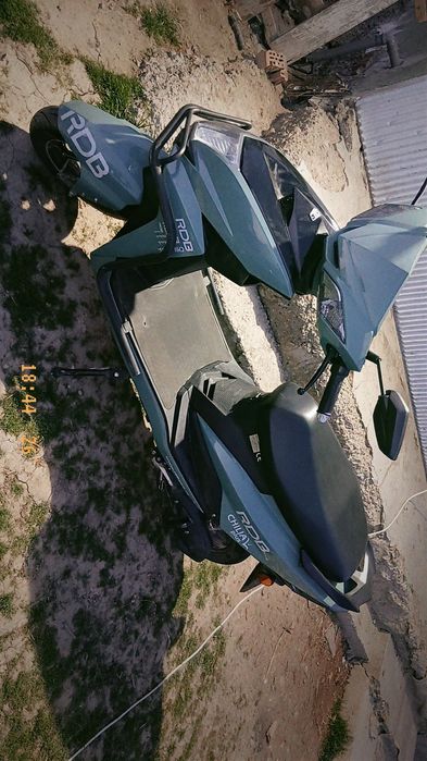 Schimb mașină manuală si scuter electric pe o  masina automată.