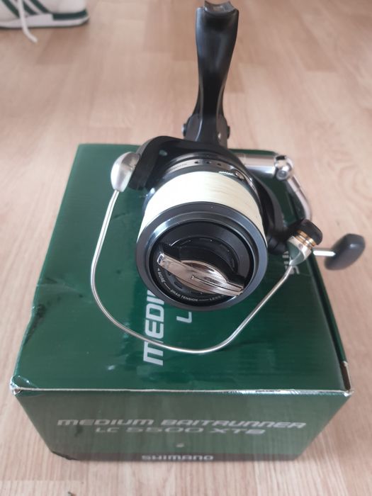 Vând   mulineta shimano medium betraner 5500 XTA