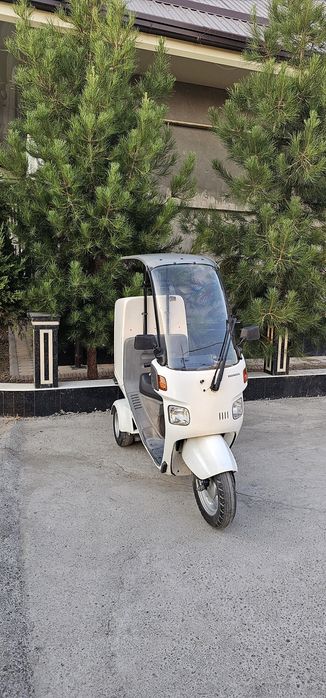 Продам скутер хонда Canopy в хорошем состоянии