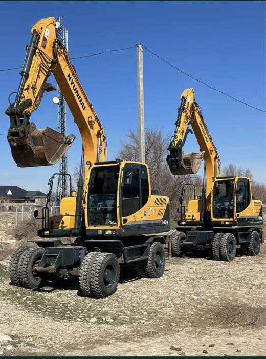 Экскаватор.Услуги колесных Экскаваторов