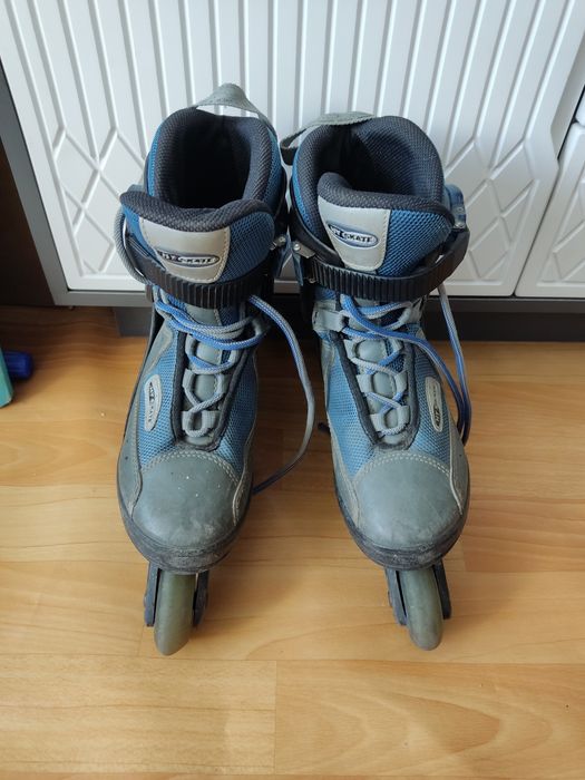 Роликовые коньки