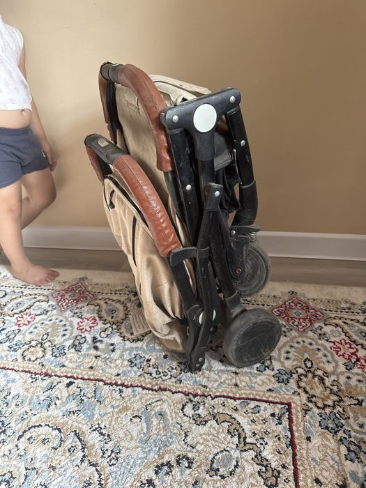 Қолданылған жиналмалы коляска