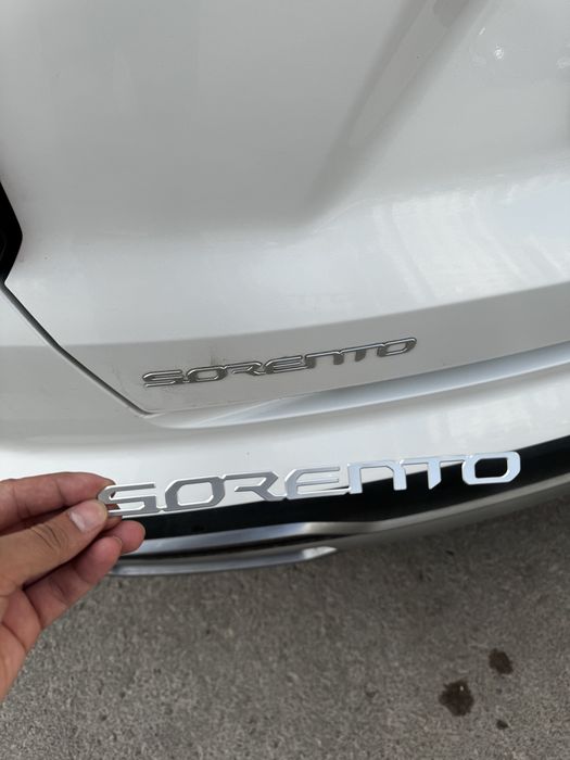 Продам эмблему Sorento