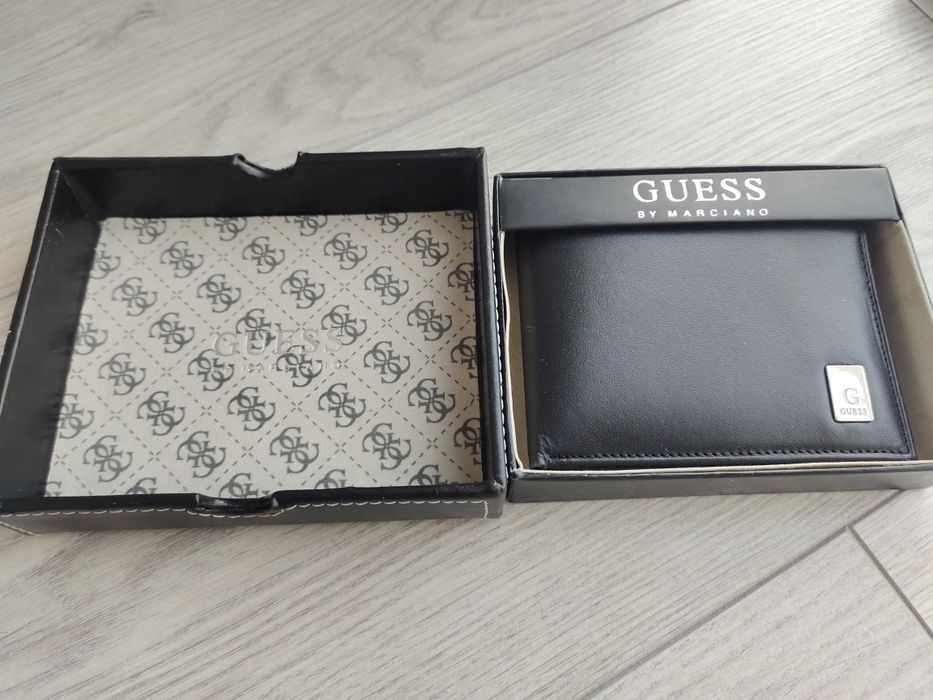 Продам оригинальный портмоне Guess