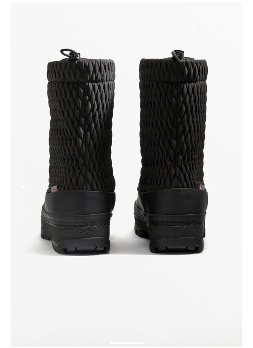 Лыжные сапоги от Oysho со скидкой -50%