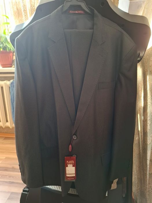 Продам новый костюм мужской