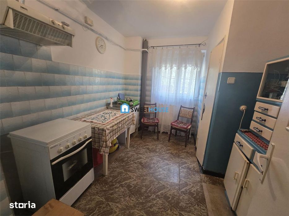 Apartament cu trei camere parter
