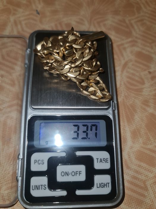 2 Lanturi si o bratara aur 18k