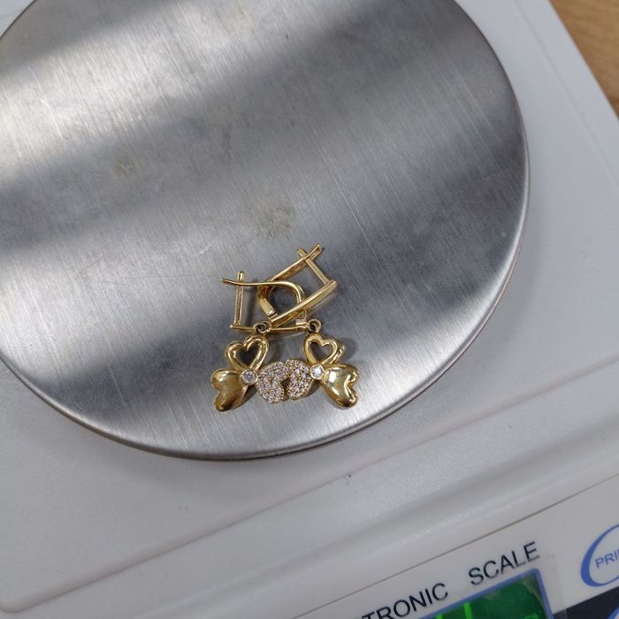 Золотие серьги 585