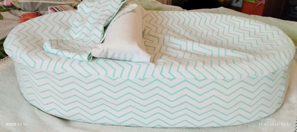 Кокон для новорожденного ребенка.