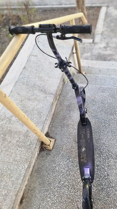 Trotineta cu ghidon reglabil