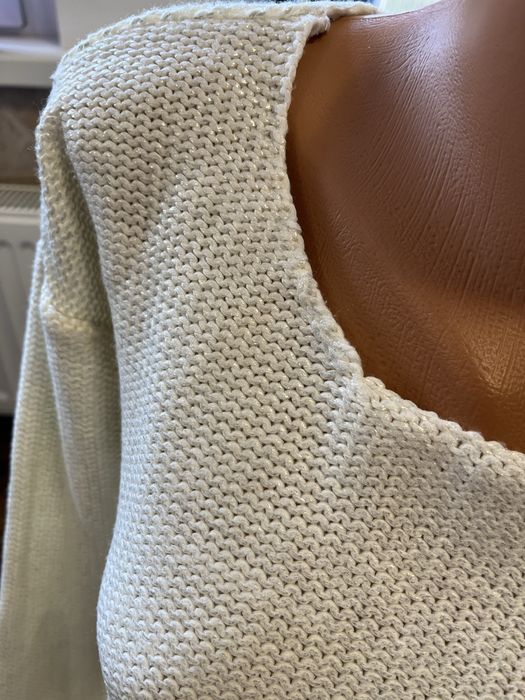 Pulover dama Page One are o pelicula lucioasa