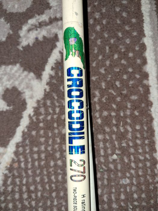 Спиннинг чёрный и белый