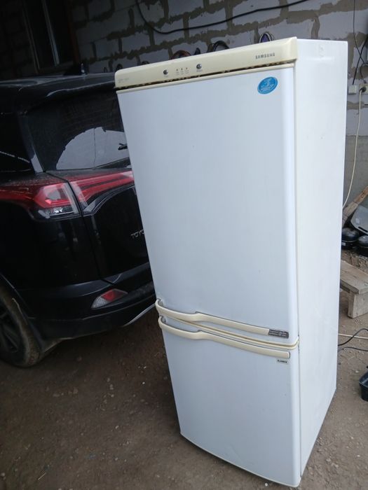 С доставкой холодильник рабочий.