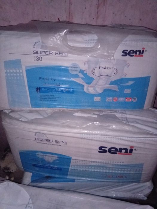Продам подгузники сени 4 разм